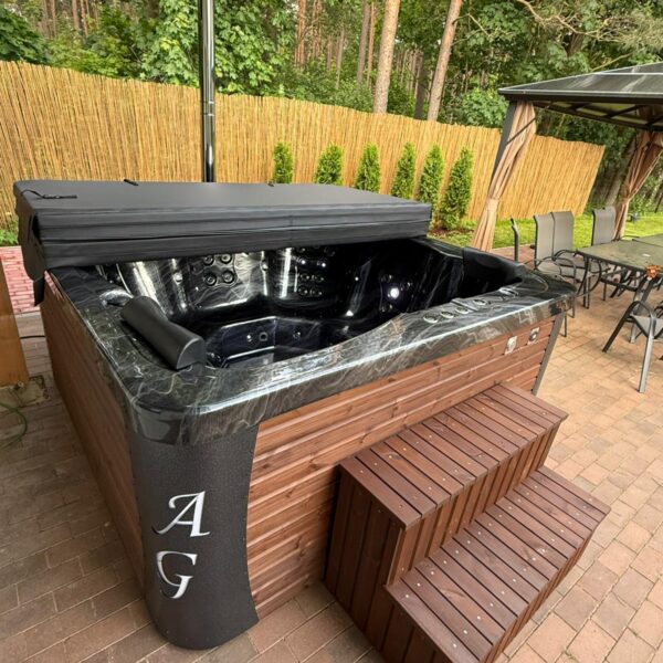 Acrylic hot tub with external stove