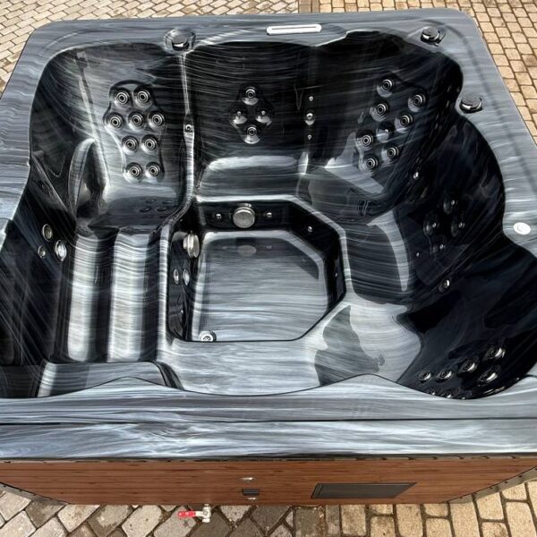 Acrylic hot tub with external stove